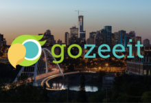 Gozeeit logo overlaying a cityscape of Edmonton at dusk, featuring a lit-up bridge with light trails from traffic and the city skyline in the background